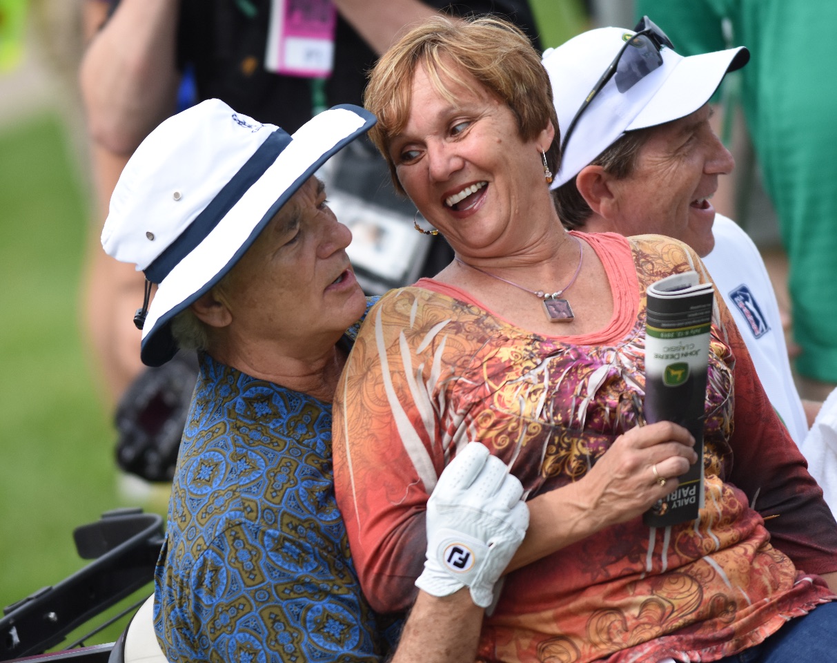 Actor Bill Murray gives a very surprised fan a ride in his golf cart up to the 3rd tee during the John Deere Classic Pro-Am, Wednesday July 8, 2015, in Silvis. (Photo by Todd Mizener - Dispatch/Argus)
