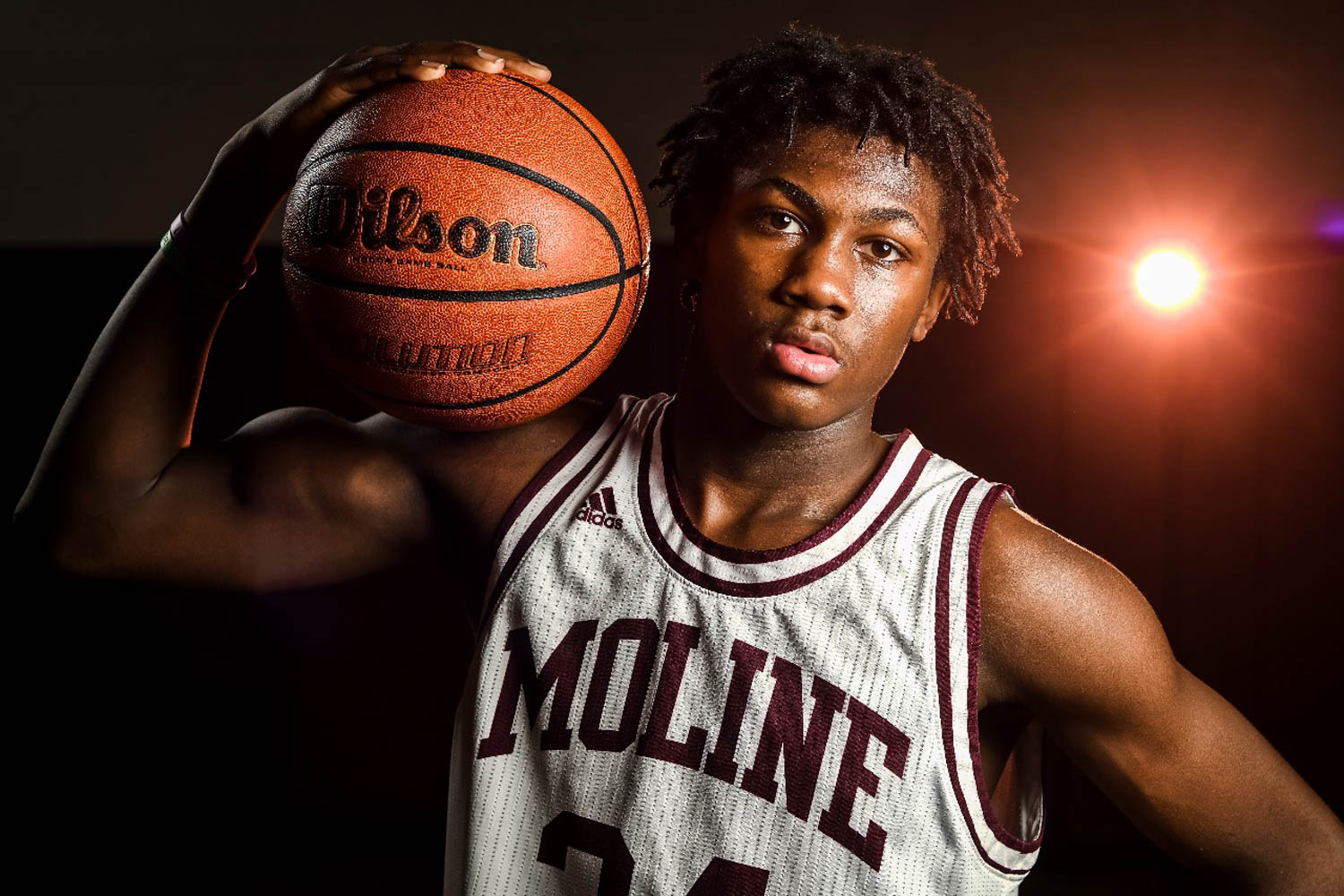 Moline sophomore Deonte Billups is this week's Dispatch•Argus•QCOnline Metro Pacesetter after helping the Maroons beat Quincy and end the Blue Devils 28-game home winning streak.  (Todd Mizener - Dispatch/Argus)